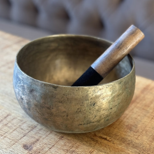 Antique singing bowl with mallet