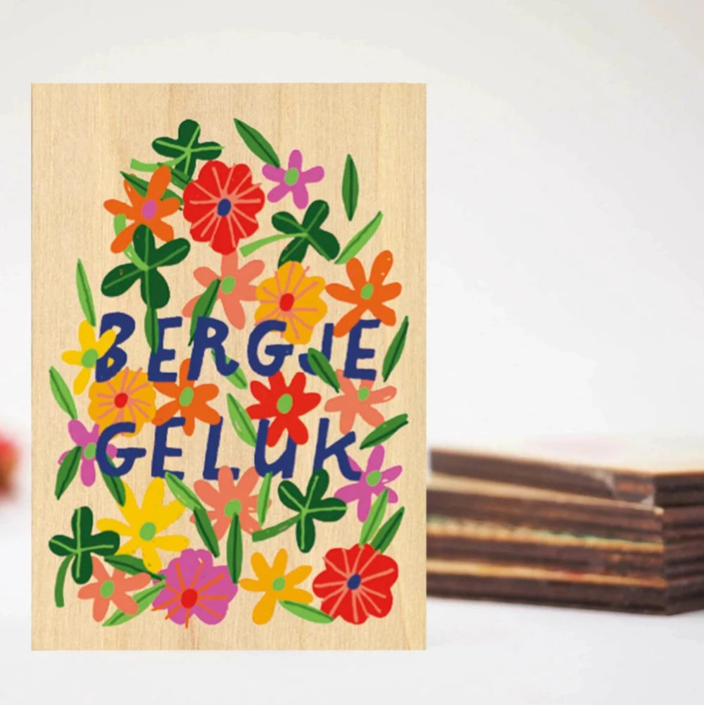 magneet met een bergje bloemen in alle kleuren